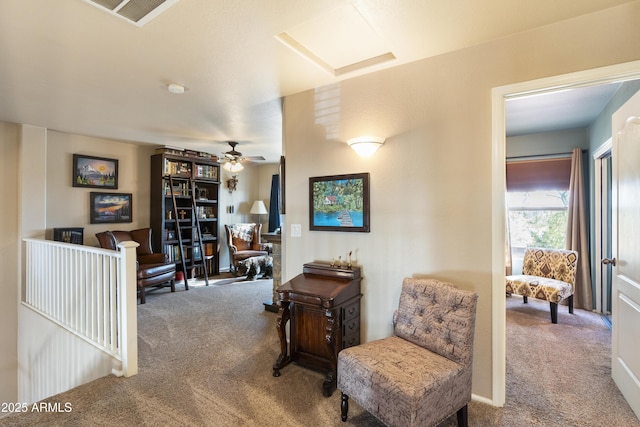 sitting room with light carpet