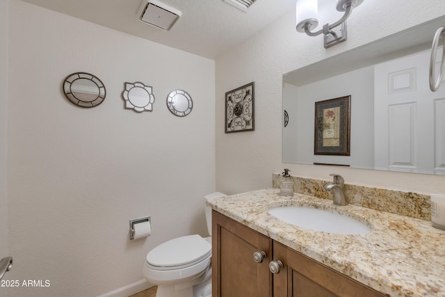 half bath with toilet and vanity