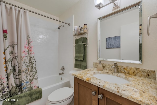 full bath with shower / bath combo, toilet, and vanity
