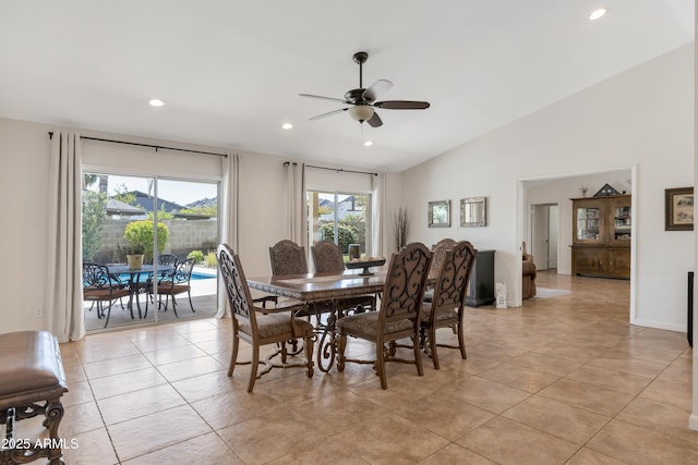 dining room featuring recessed lighting, lofted ceiling, light tile patterned floors, and ceiling fan