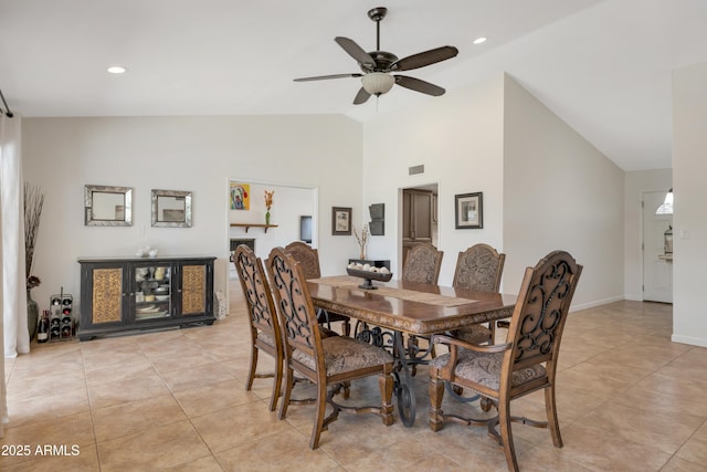 dining area featuring vaulted ceiling, recessed lighting, light tile patterned flooring, visible vents, and ceiling fan