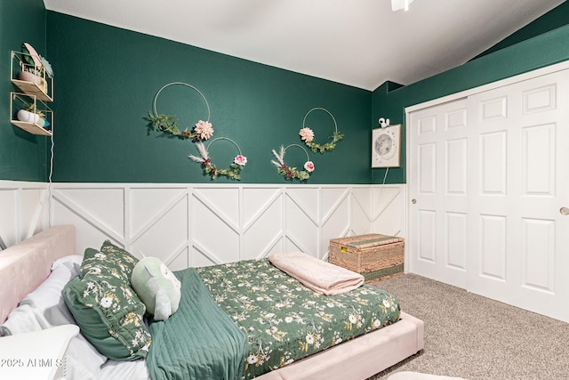 carpeted bedroom with a closet