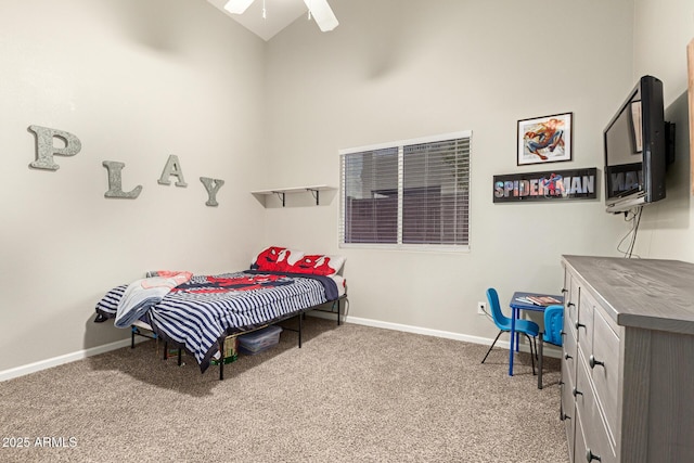 carpeted bedroom featuring ceiling fan and lofted ceiling