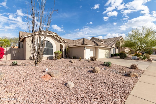 view of front of property featuring a garage