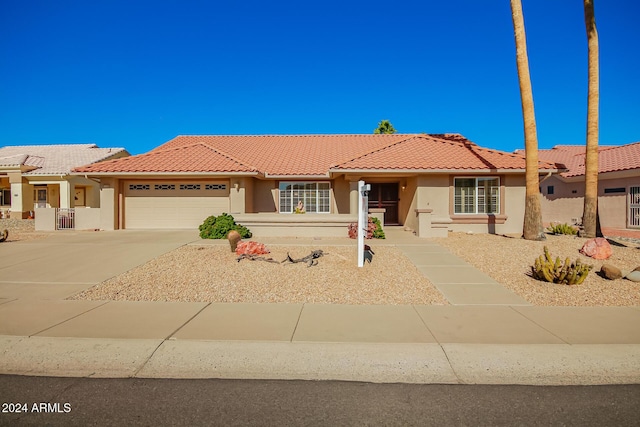 view of front of house with a garage