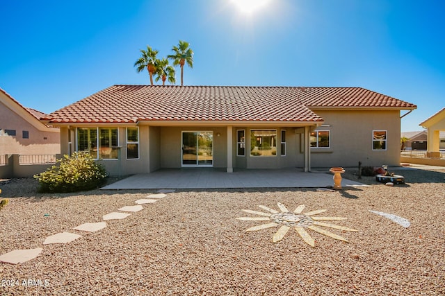 rear view of house with a patio area