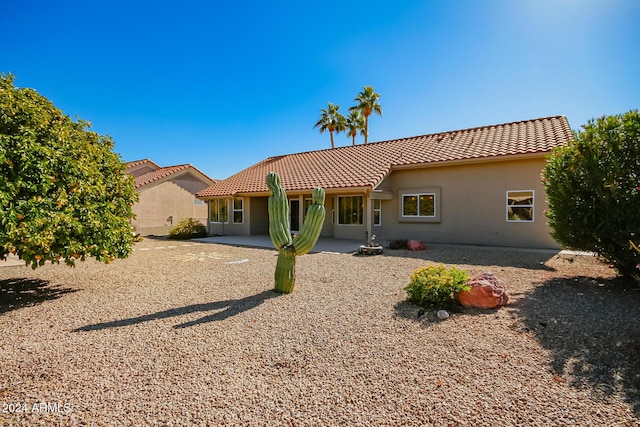 rear view of house featuring a patio area