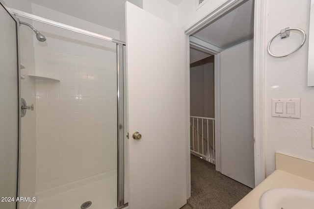 bathroom featuring walk in shower