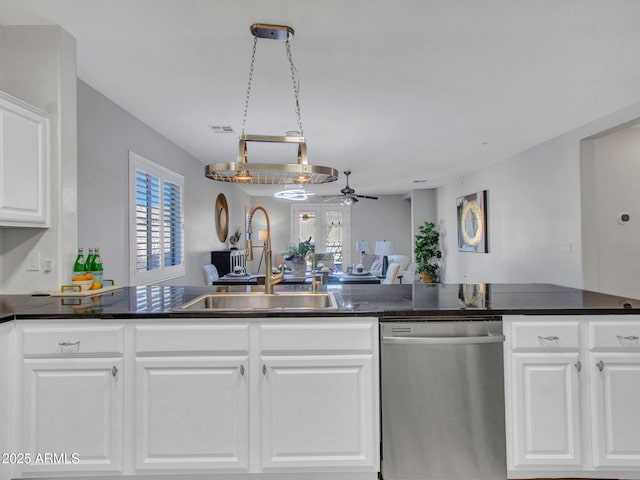 kitchen featuring pendant lighting, sink, ceiling fan, white cabinetry, and stainless steel dishwasher