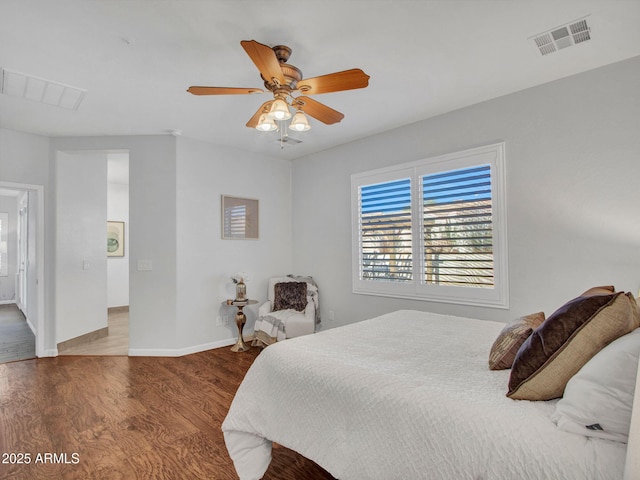 bedroom featuring wood-type flooring and ceiling fan