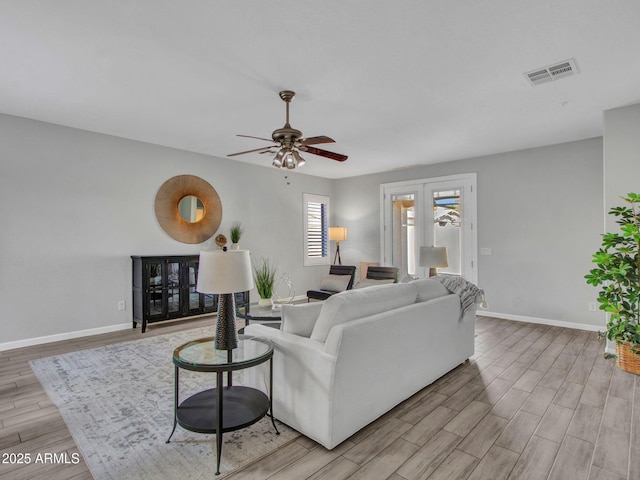 living room featuring ceiling fan