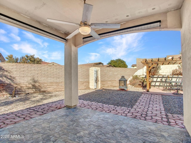 view of patio with ceiling fan