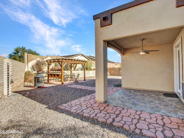 view of patio / terrace with ceiling fan