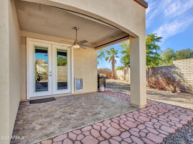 view of patio / terrace with french doors and ceiling fan