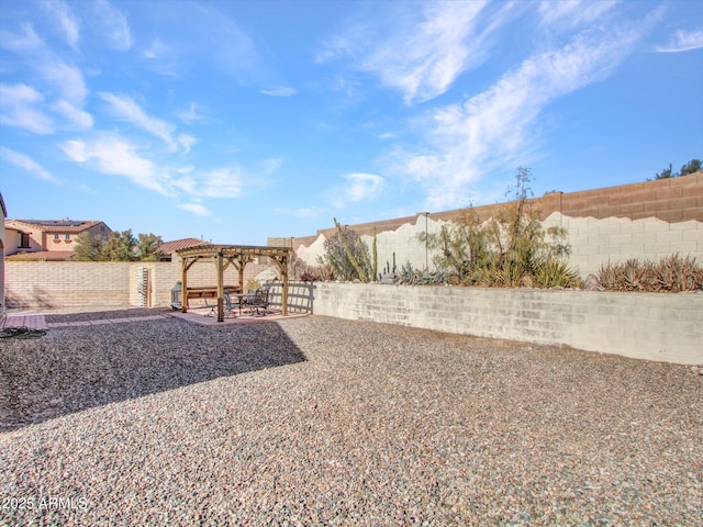 view of yard featuring a pergola and a patio