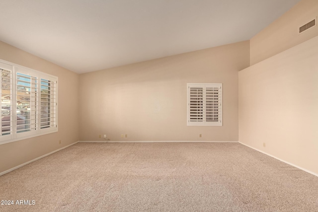 unfurnished room featuring carpet floors