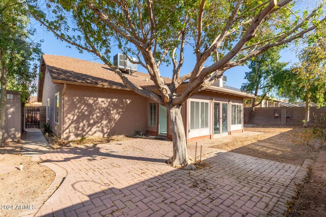 rear view of house featuring a patio area