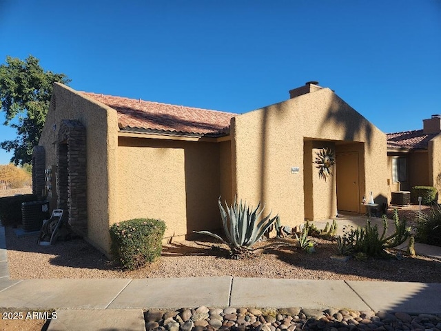 view of front of property featuring central AC unit