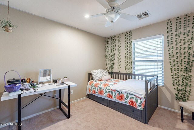 carpeted bedroom with ceiling fan