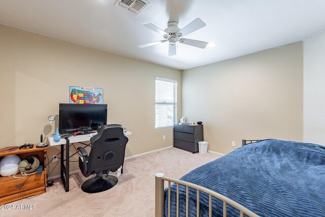 bedroom with ceiling fan and light colored carpet