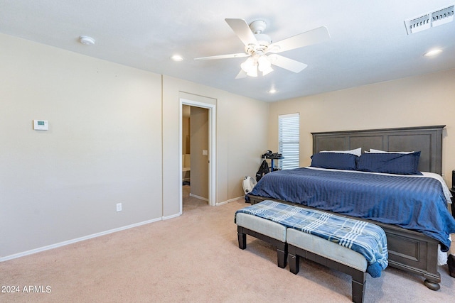 bedroom featuring ceiling fan and light carpet