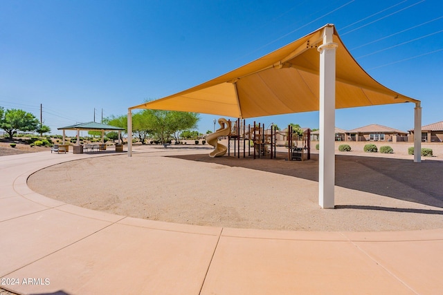 surrounding community featuring a gazebo and a playground