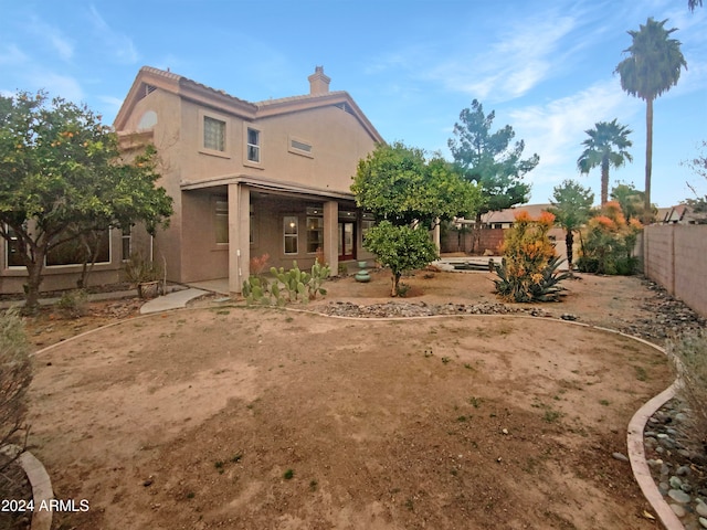 back of house featuring a patio