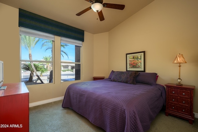 carpeted bedroom featuring ceiling fan and lofted ceiling