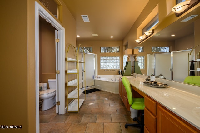 full bathroom with tile patterned floors, vanity, plus walk in shower, and toilet