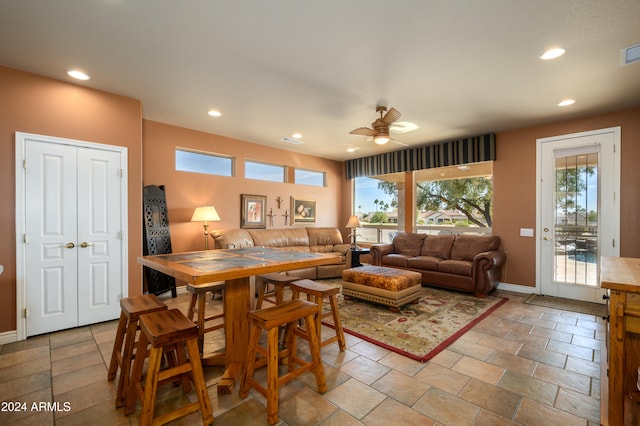 living room with ceiling fan