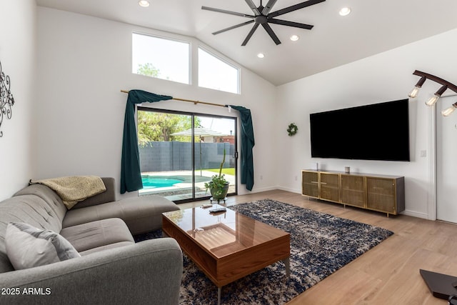 8155 E Columbus Ave, Scottsdale, AZ 85251 - living room featuring ceiling fan, wood finished floors, recessed lighting, and high vaulted ceiling