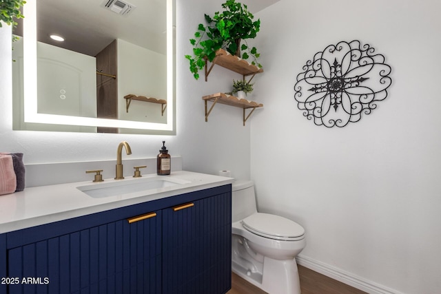 8155 E Columbus Ave, Scottsdale, AZ 85251 - bathroom featuring wood finished floors and vanity