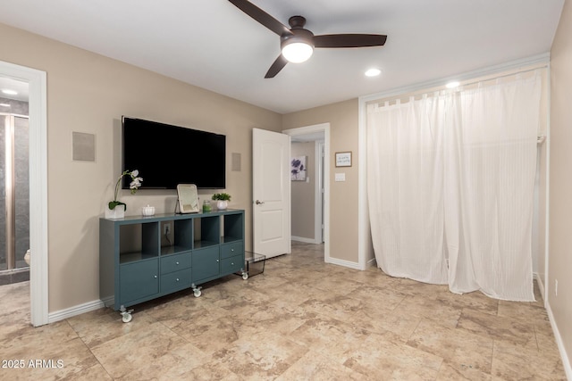 8155 E Columbus Ave, Scottsdale, AZ 85251 - living room with ceiling fan and baseboards