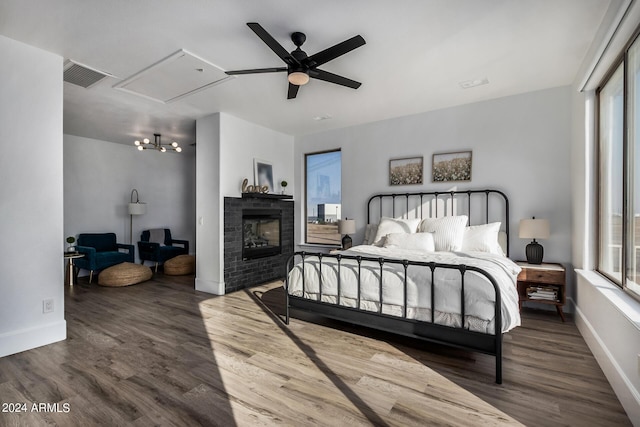 bedroom featuring hardwood / wood-style flooring and ceiling fan