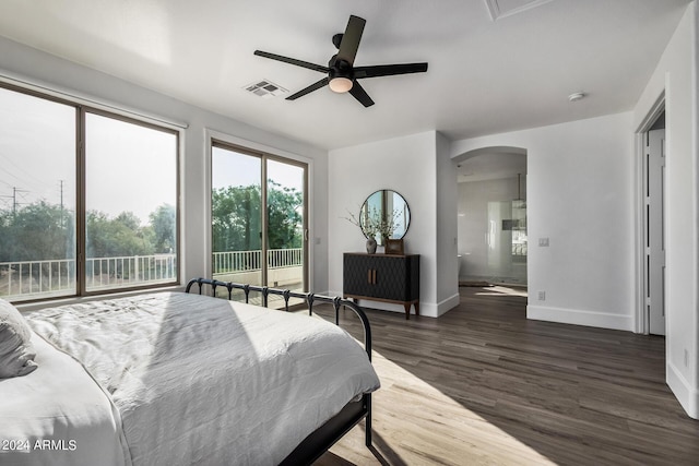 bedroom with dark hardwood / wood-style floors, access to outside, and ceiling fan