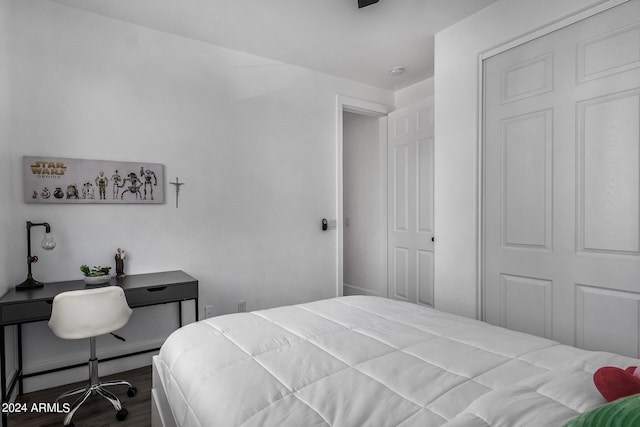 bedroom featuring wood-type flooring