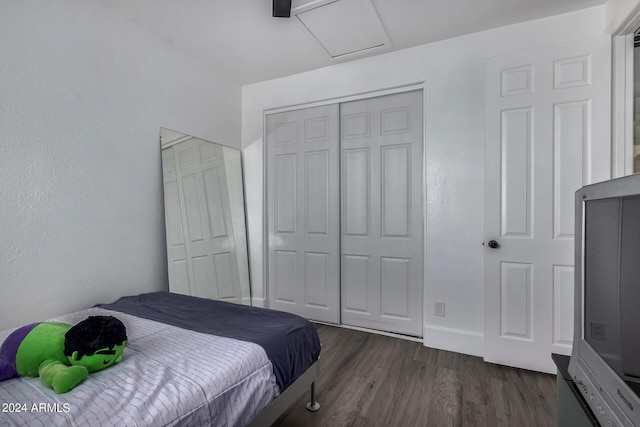 bedroom featuring dark hardwood / wood-style floors