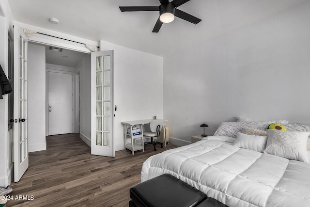 bedroom featuring dark wood-type flooring, ceiling fan, and french doors