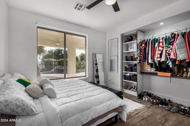 bedroom with hardwood / wood-style flooring and ceiling fan