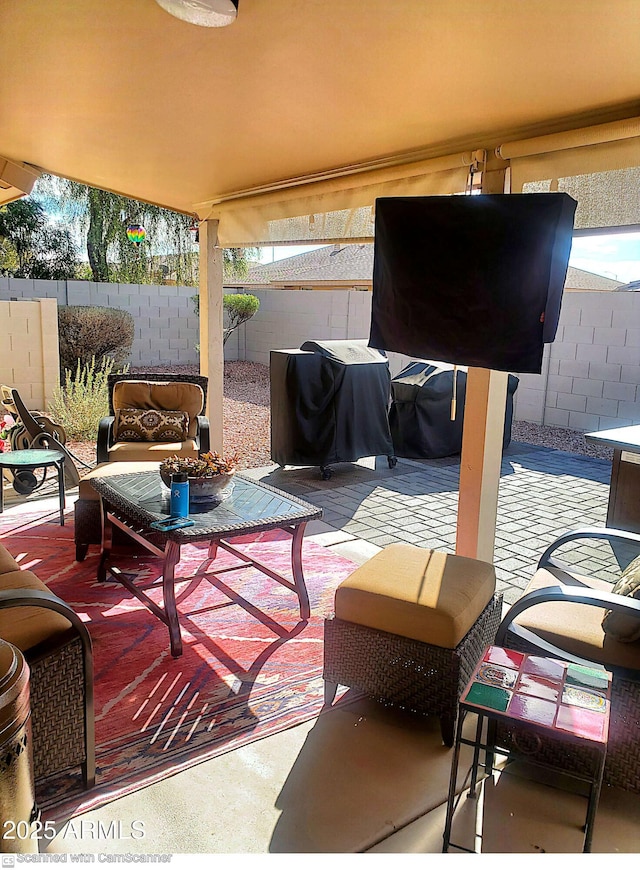 view of patio / terrace featuring area for grilling and an outdoor hangout area