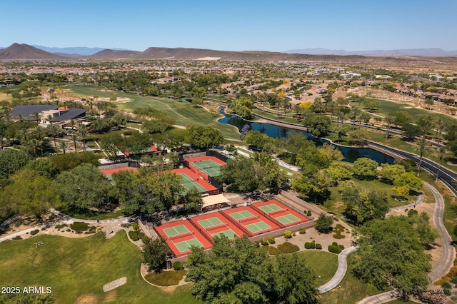 aerial view featuring a water and mountain view