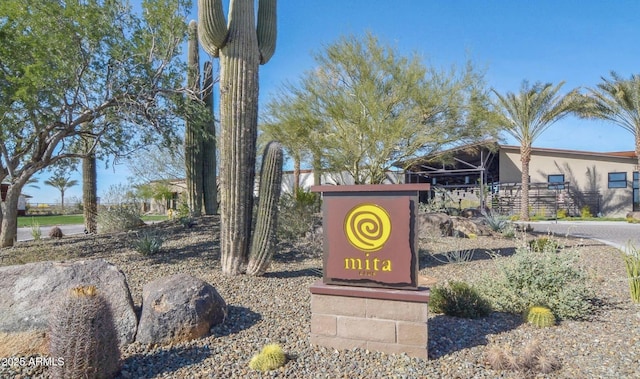 view of community sign