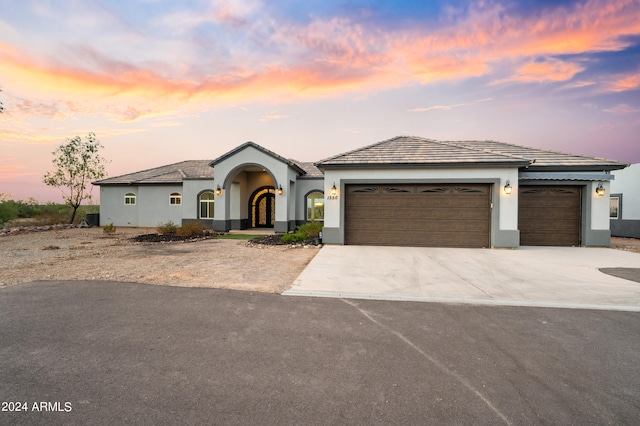 view of front of property featuring a garage