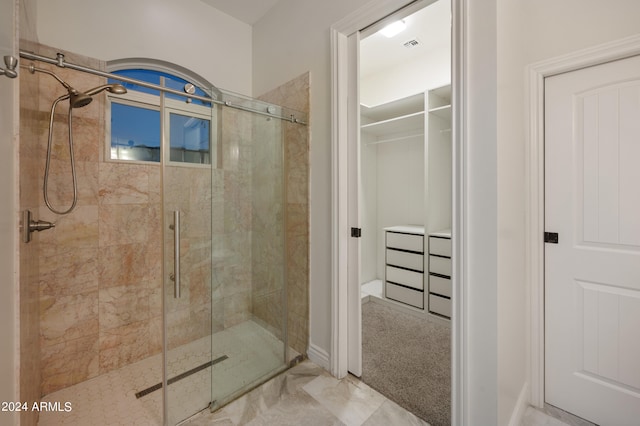 bathroom with an enclosed shower