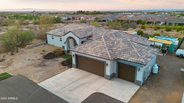 view of aerial view at dusk