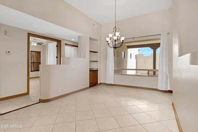 11266 W Calle Con Queso, Casa Grande, AZ 85194 - empty room featuring a chandelier, built in features, baseboards, and ceiling fan
