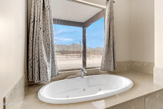 11266 W Calle Con Queso, Casa Grande, AZ 85194 - bathroom with a jetted tub and a mountain view