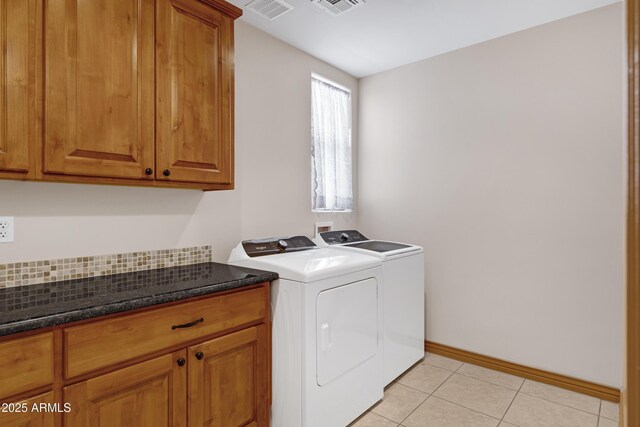 11266 W Calle Con Queso, Casa Grande, AZ 85194 - laundry room with independent washer and dryer, cabinet space, light tile patterned floors, and baseboards