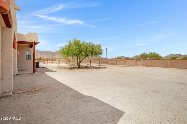 11266 W Calle Con Queso, Casa Grande, AZ 85194 - fenced backyard with central AC unit and a mountain view