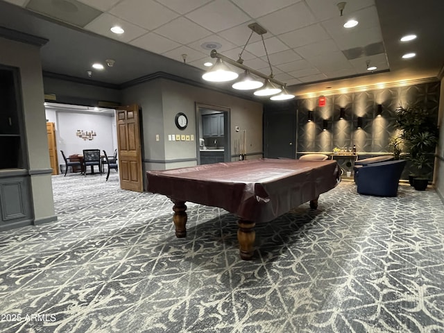 game room featuring billiards, ornamental molding, carpet floors, and a drop ceiling